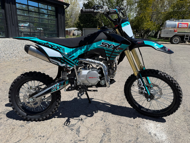 KICKIN customer with a dirt bike