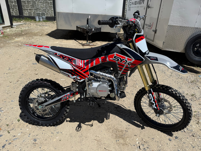 KICKIN customer with a dirt bike