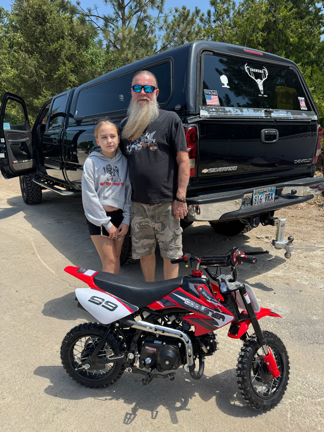 KICKIN customer with a dirt bike